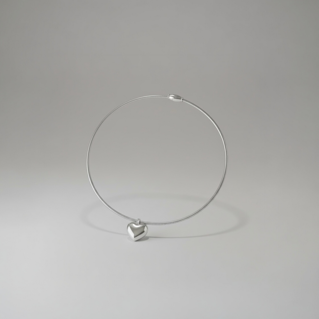 Silver heart pendant necklace shown 