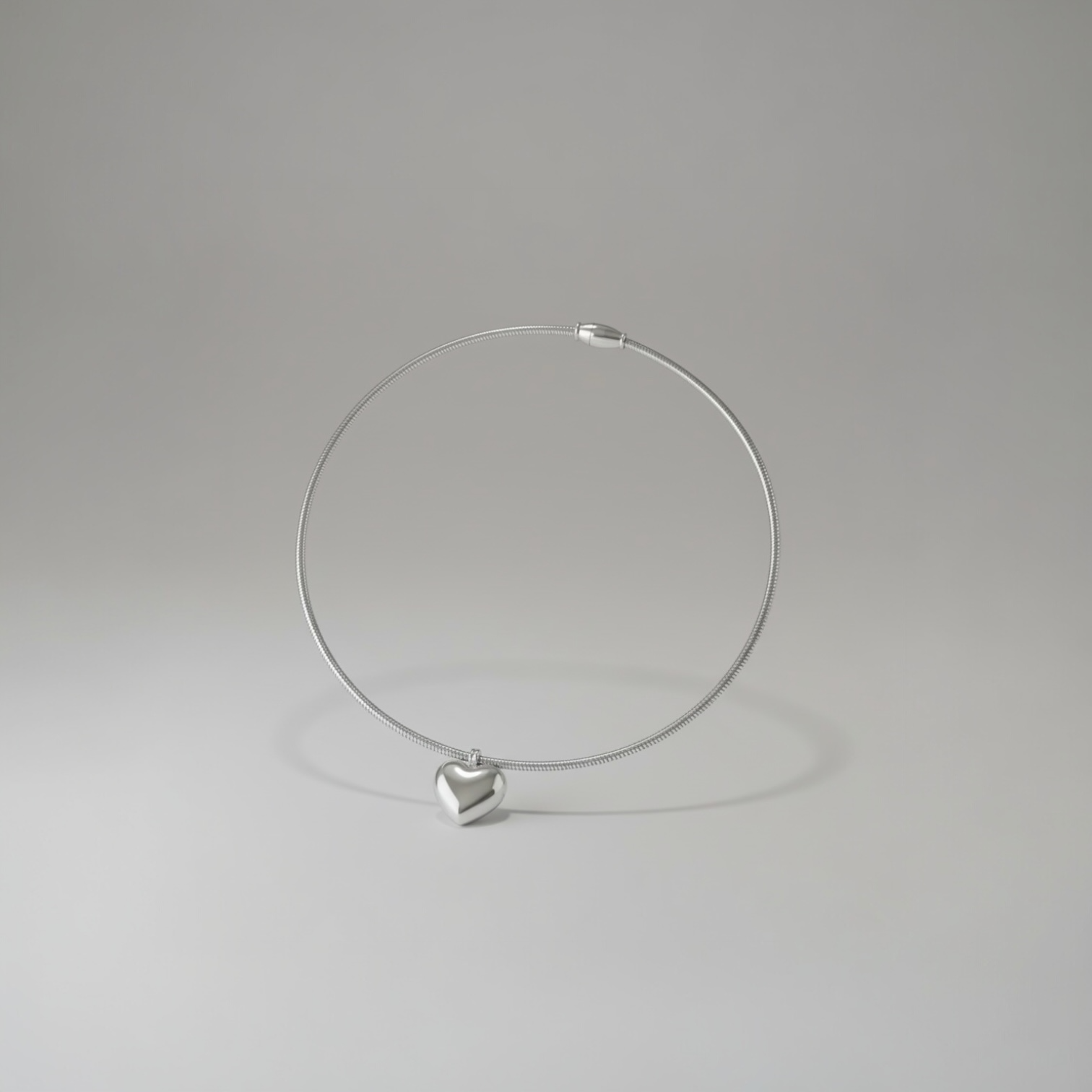 Silver heart pendant necklace shown 