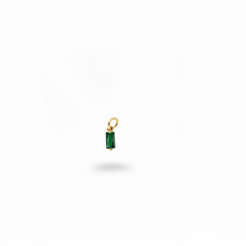 emerald-green baguette crystal charm with gold-plated loop.