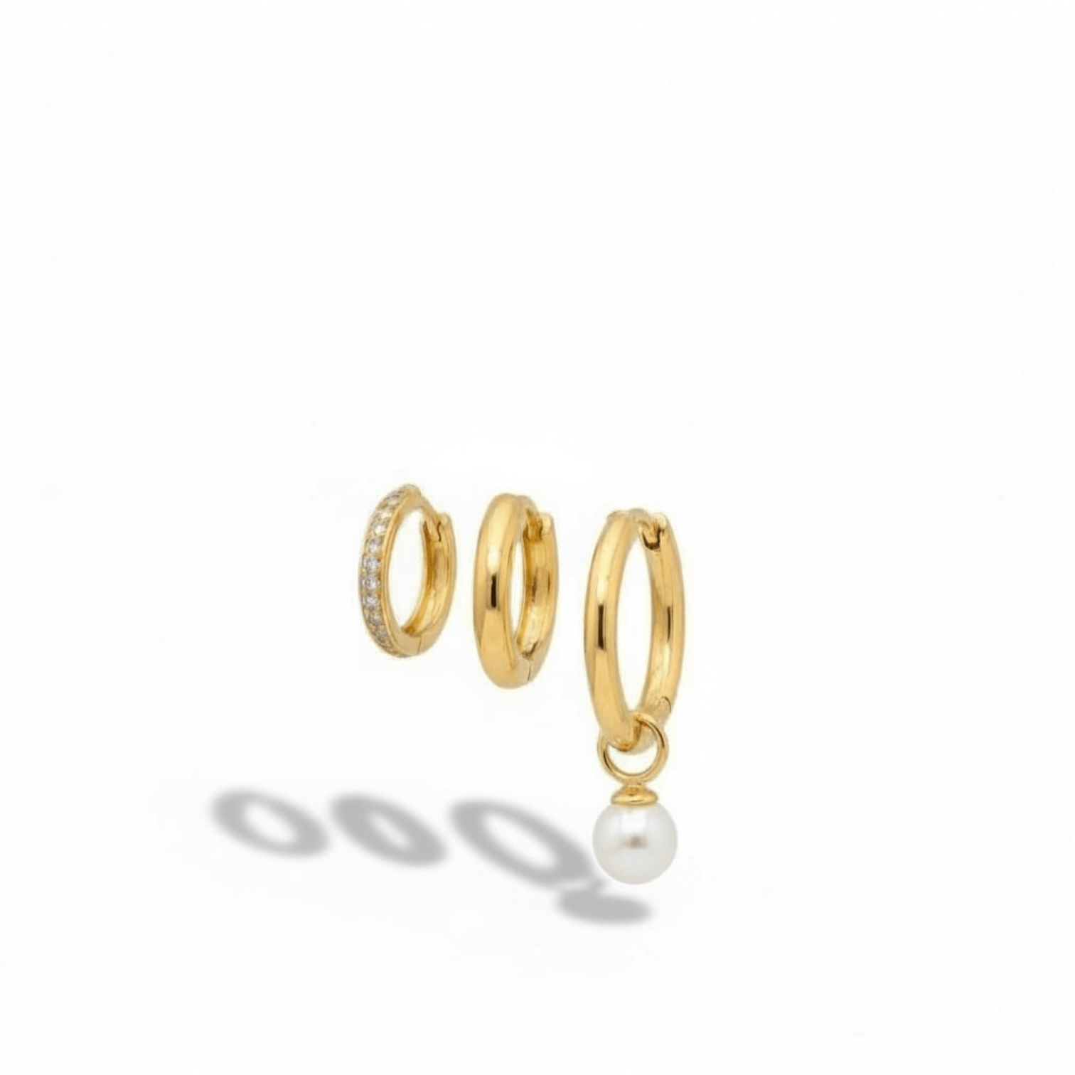 Gold-tone trio hoop earring set with zircon and pearl charm – product photo