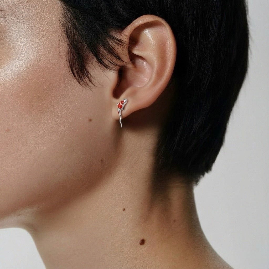 Koi fish cartilage earring, worn on ear cartilage side view