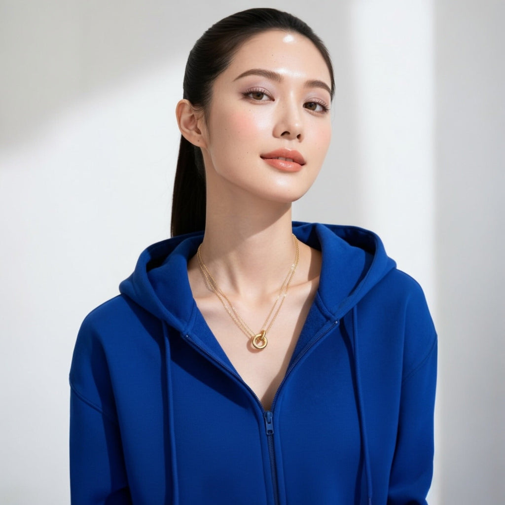 Layered Circle Necklace worn on model layered chains neckline view