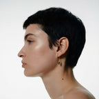 Model wearing 925 silver safety pin earring