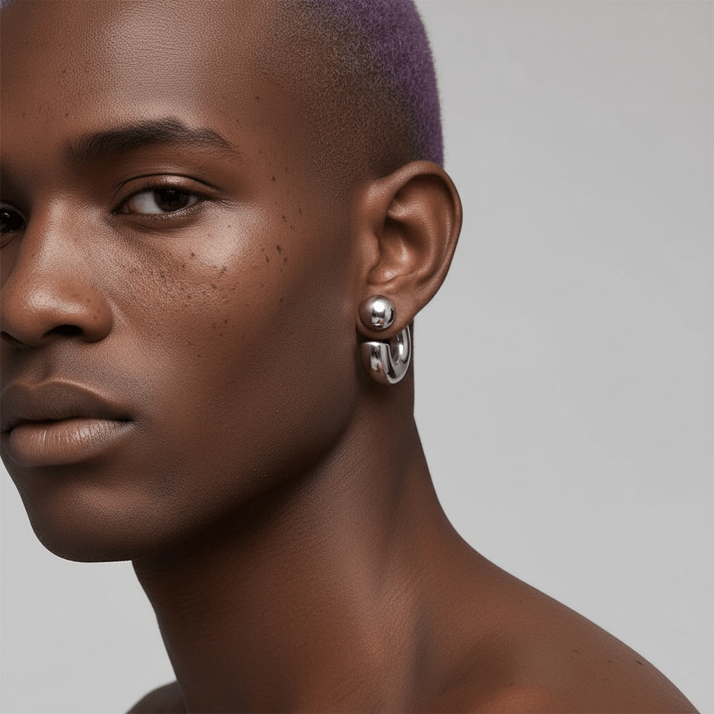 Model wearing Smooth Chunky Hoop Earrings – 18K PVD Gold Plated – OMON