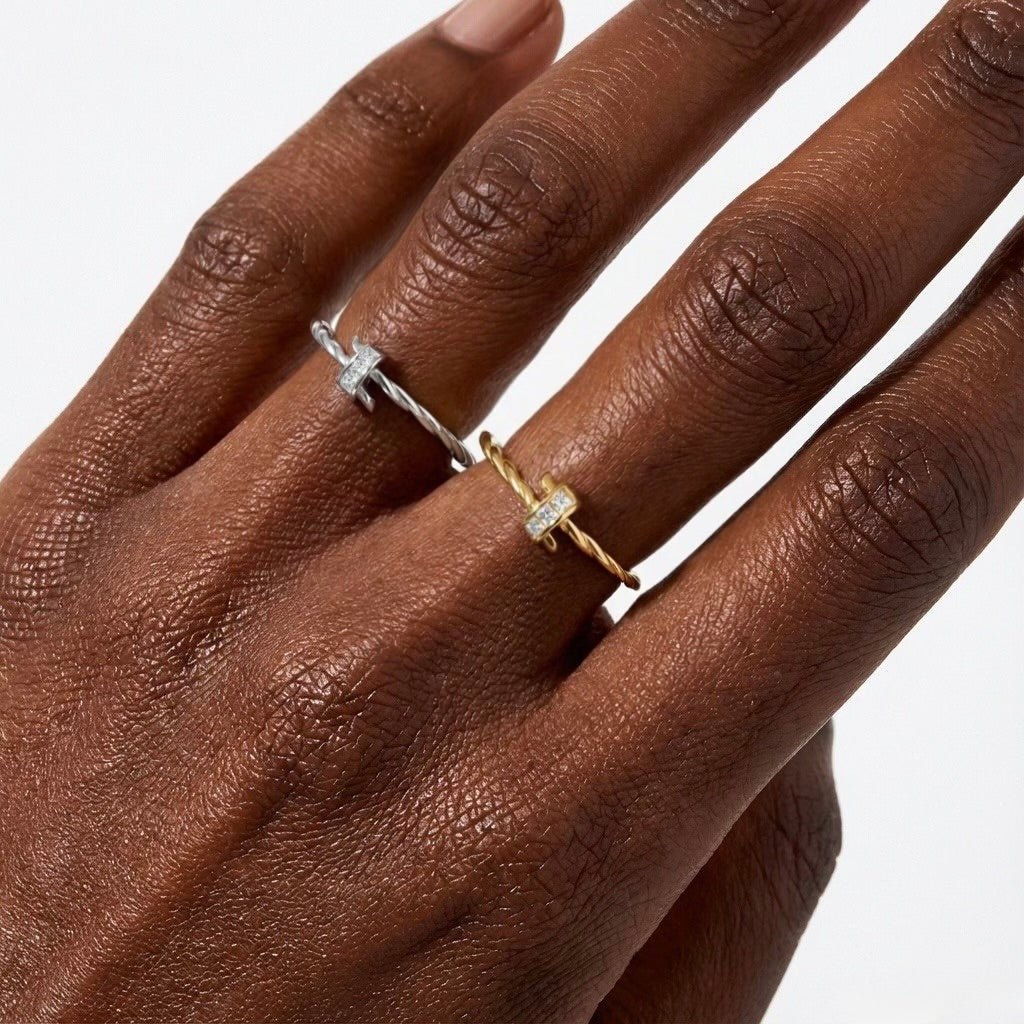 Twisted Rope CZ Ring close-up on hand, rope-texture band and bezel-set zircon