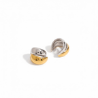Close-up detail of two-tone ear cuff earrings in stainless steel with 18K PVD gold and silver plating