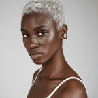 Model wearing two-tone ear cuff earrings with 18K PVD gold and silver plating – side view